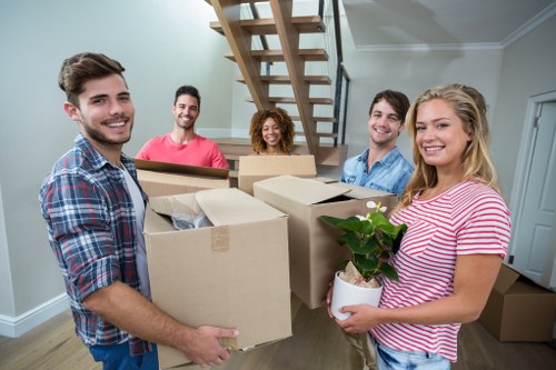 Man With Van Greenwich pricing overview with moving boxes and van