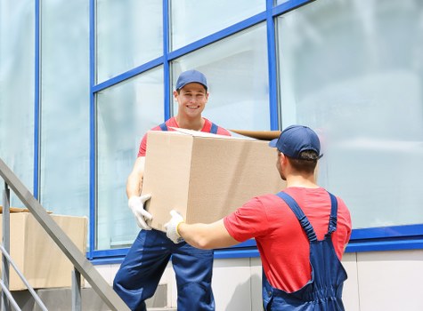 Commercial moving team handling office furniture in Greenwich