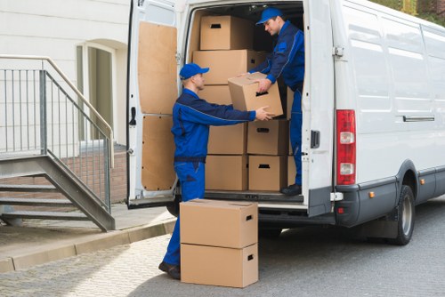 Loading furniture into a removals van in Greenwich