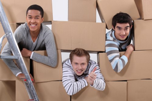 Loading furniture into a removal van near Greenwich homes