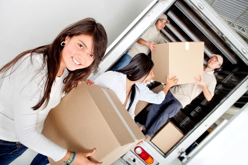 Household moving day support in Greenwich with careful furniture transport