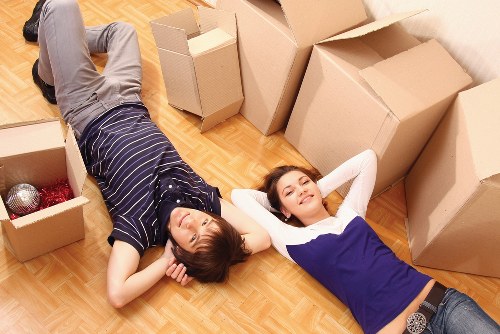 Packed office furniture and equipment ready for removal