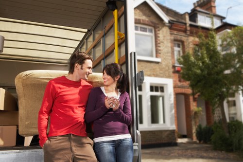 Loading boxes and furniture into a removal van